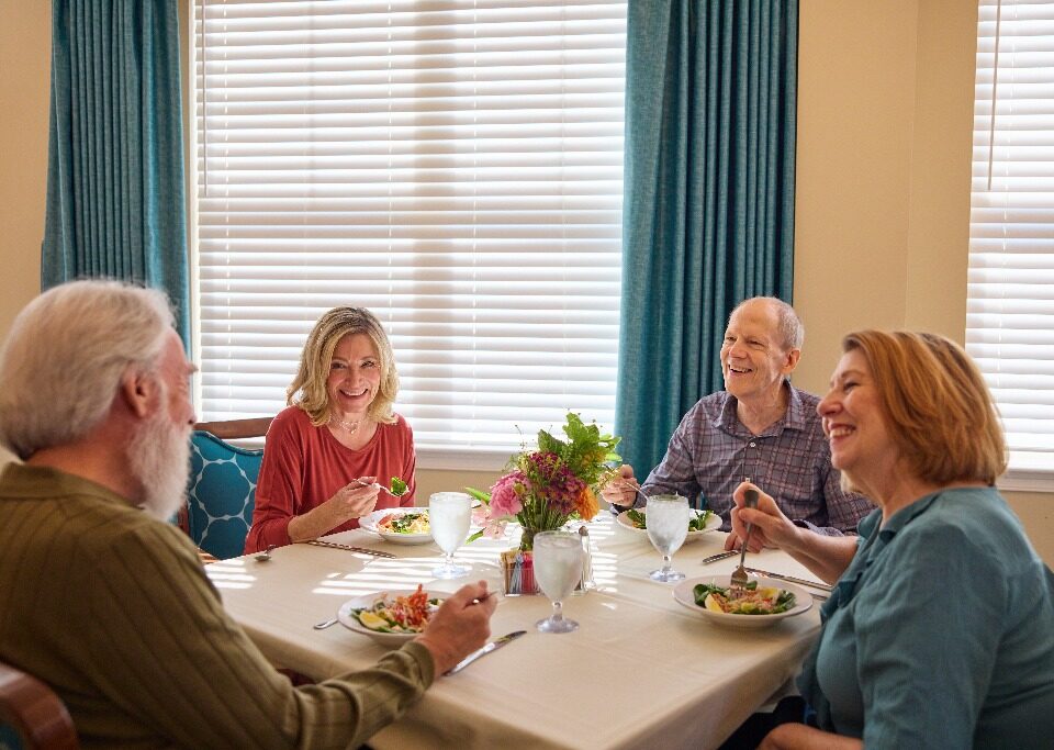 Friendship Village Assisted Living residents enjoying dinner